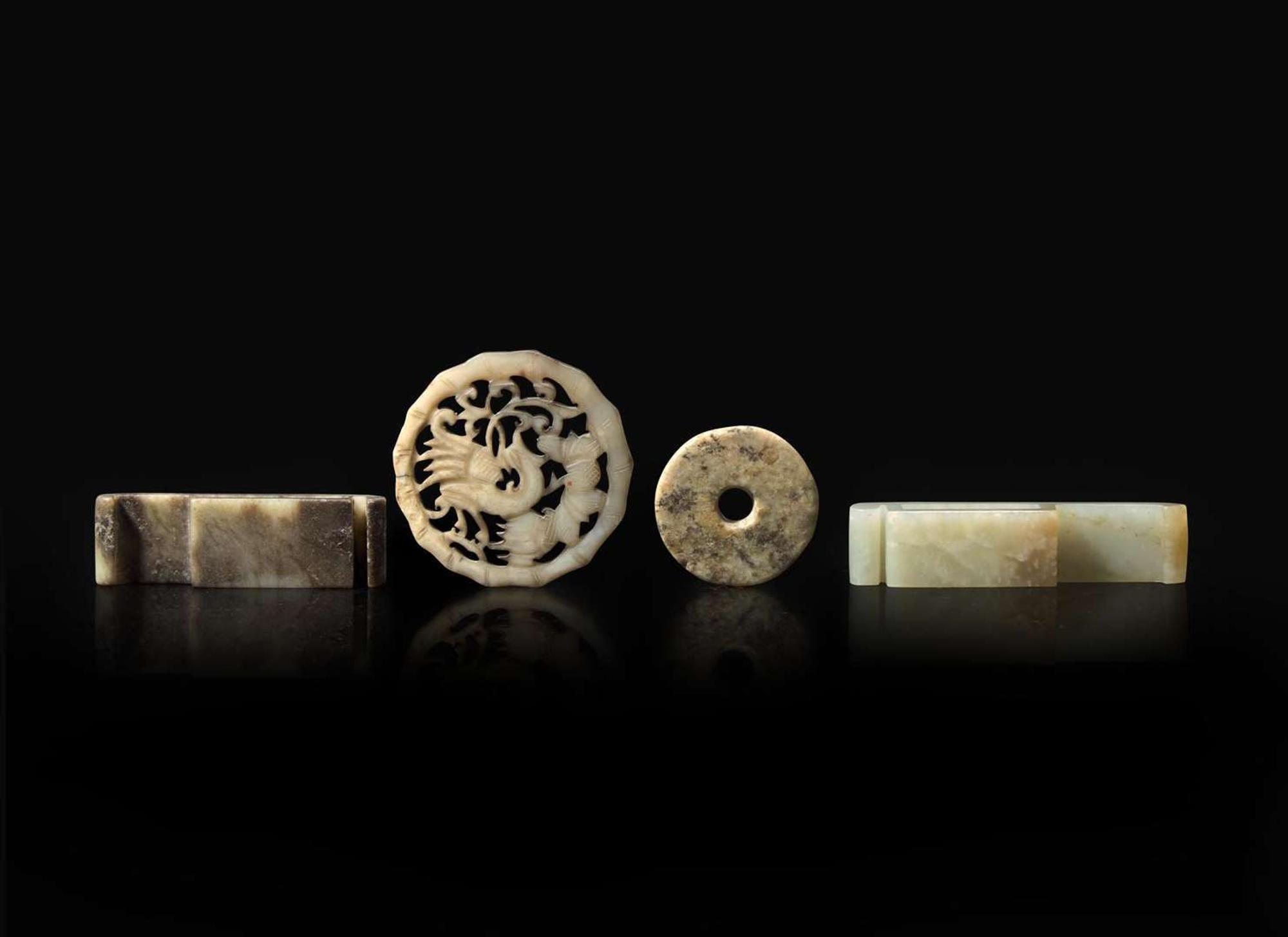 A group of four Chinese assorted jades 劍璏及玉珮一組四件