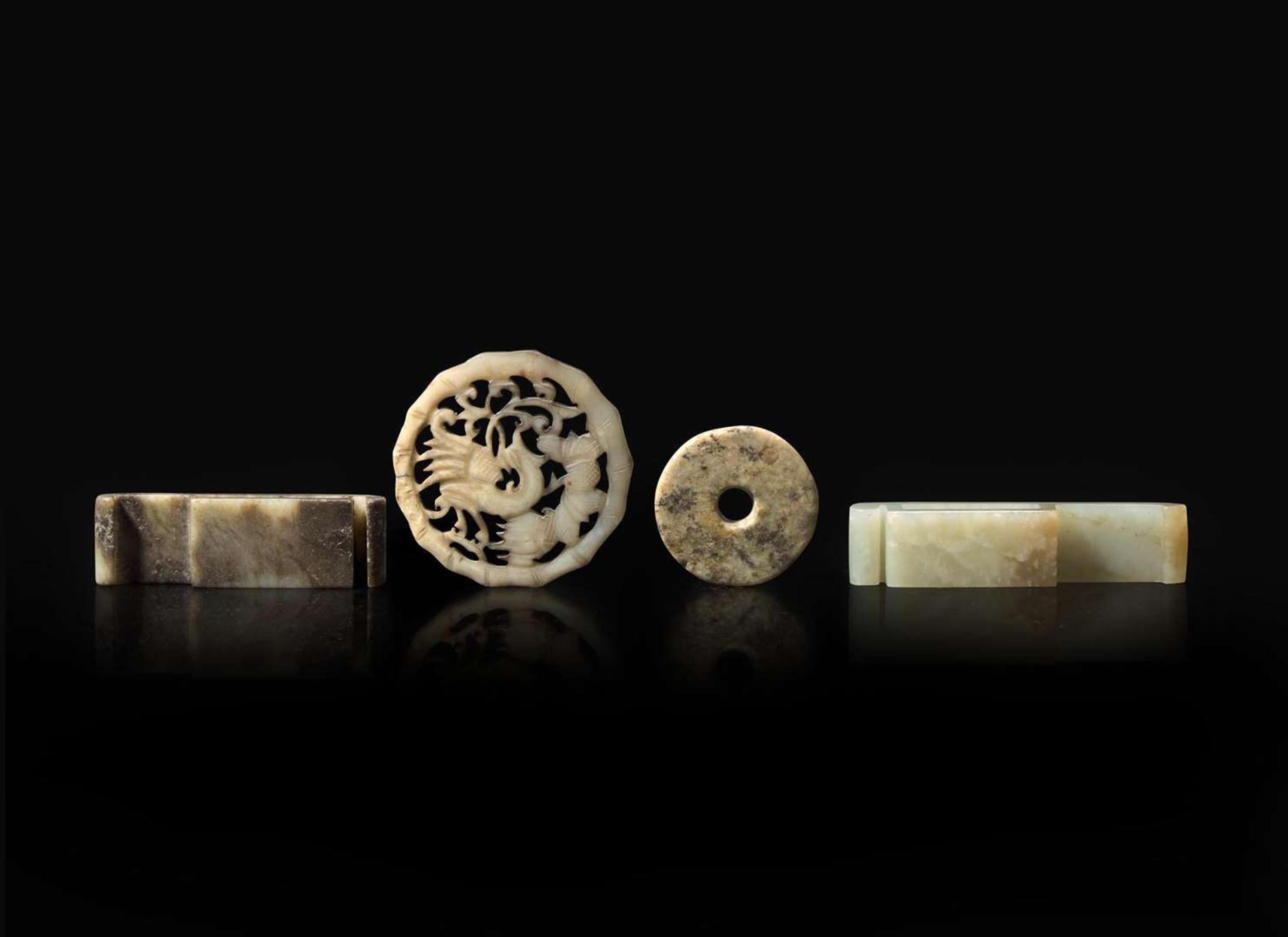 A group of four Chinese assorted jades 劍璏及玉珮一組四件