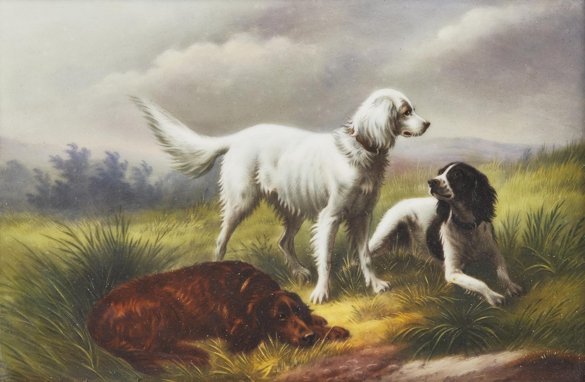 A German Hand-Painted Porcelain Plaque Depicting Three Spaniels