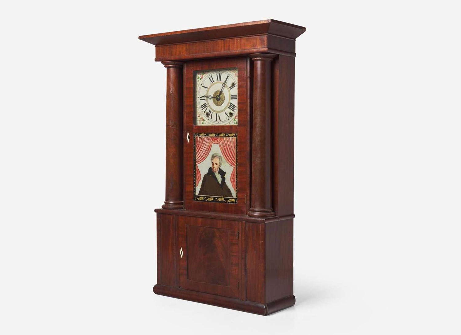 A Classical mahogany and mahogany veneer mantel clock with Andrew Jackson eglomise panel, bears printed paper label of Rodney Brace, North Bridgewater, MA, dated "1834"