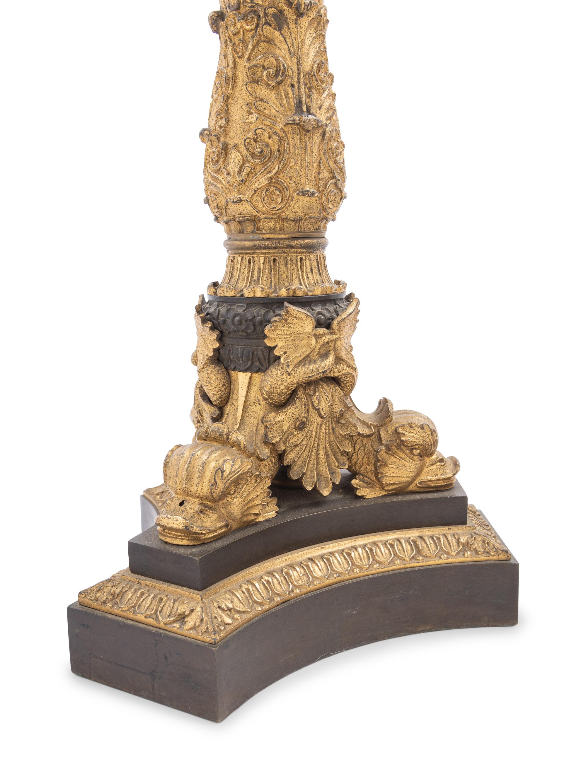 A Pair of Louis Philippe Gilt and Patinated Bronze Candelabra Mounted as Lamps