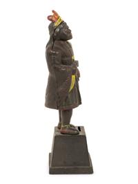 An Old Honesty Cast Iron Indian Cigar Bank, PLUS