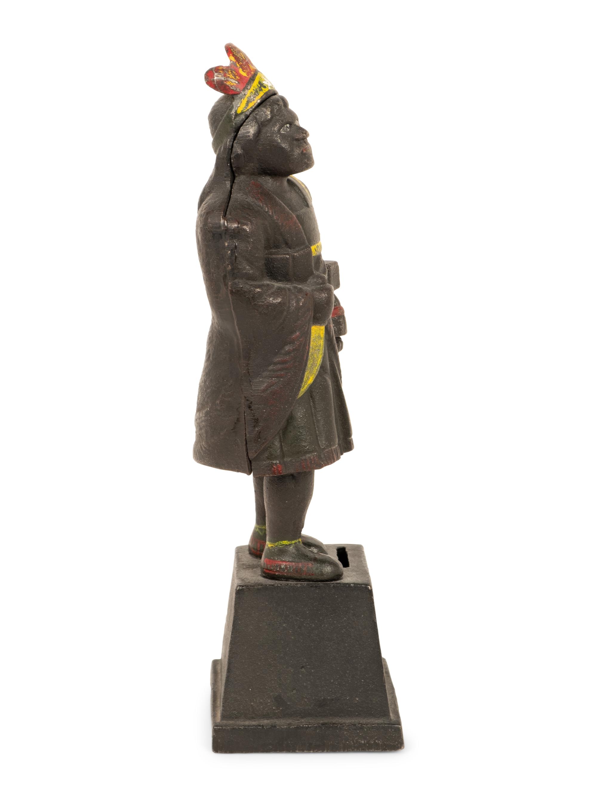 An Old Honesty Cast Iron Indian Cigar Bank, PLUS