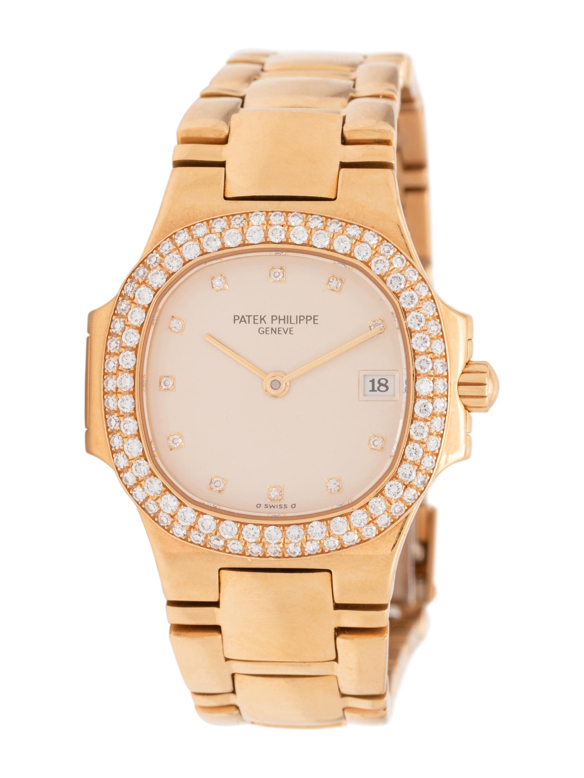 PATEK PHILIPPE, REF. 4700 18K YELLOW GOLD AND DIAMOND 'NAUTILUS' WATCH