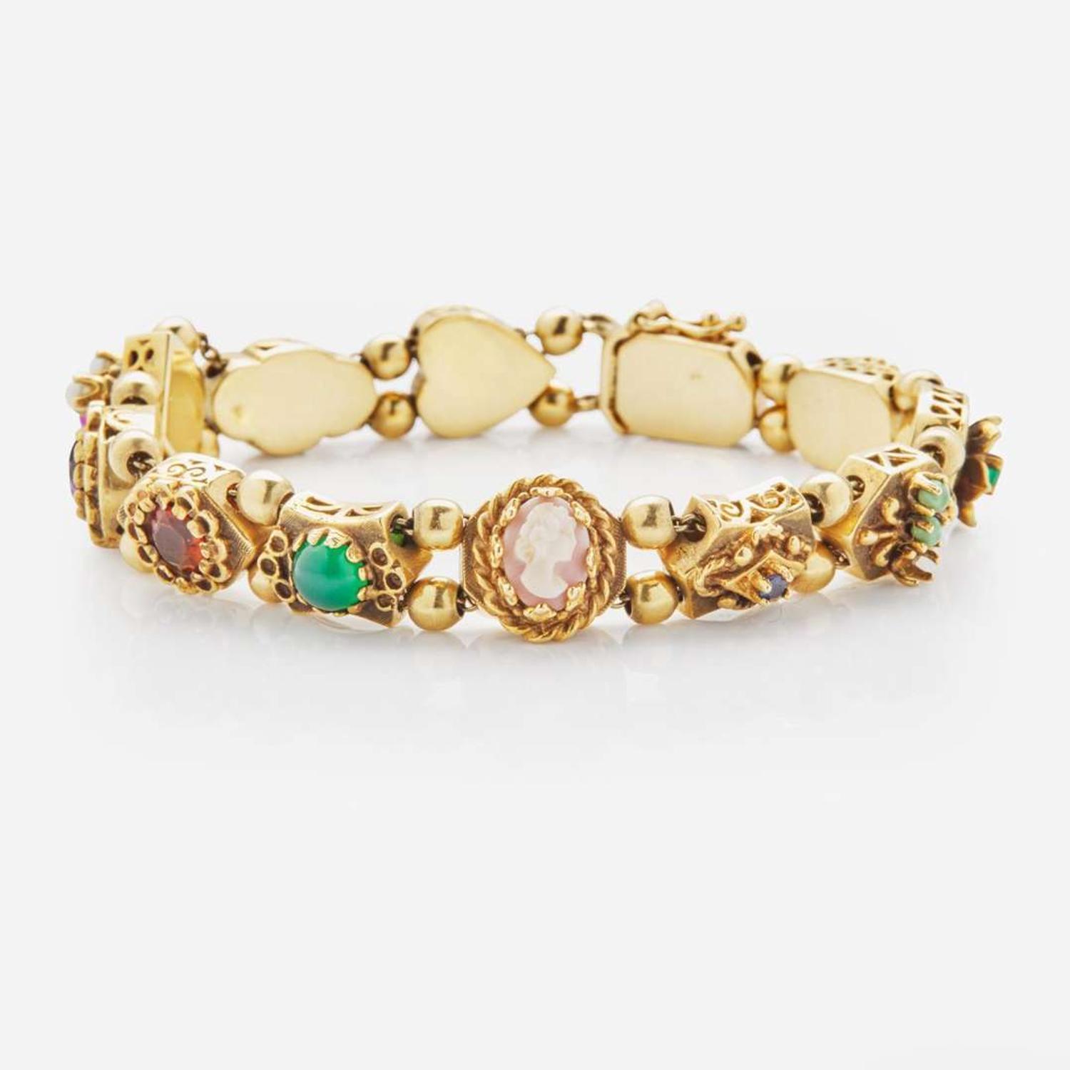 A 14K Yellow Gold Vintage Slide Charm Bracelet