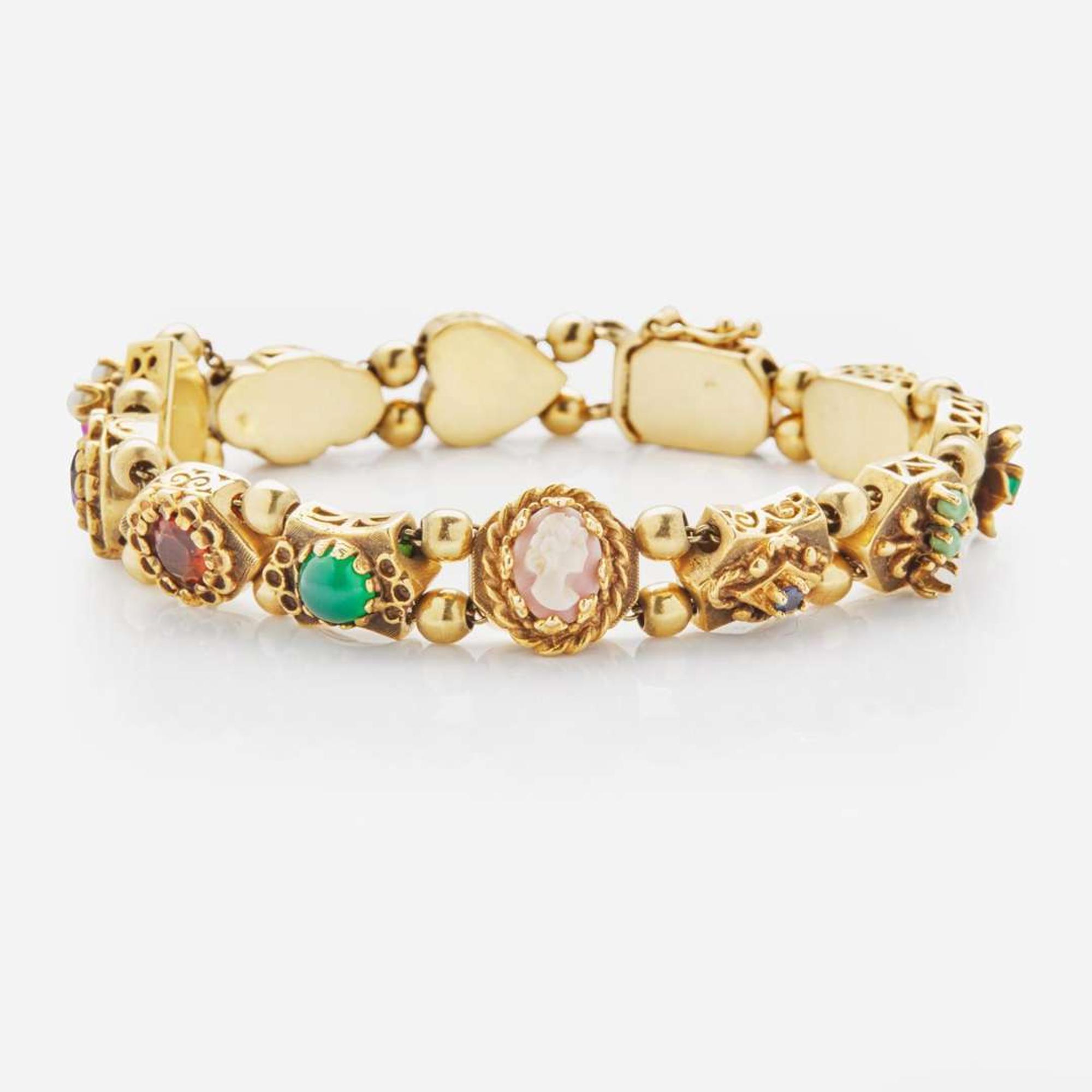 A 14K Yellow Gold Vintage Slide Charm Bracelet