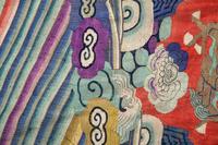A Red Ground Kesi Woven Silk Theatrcial 'Dragon' Robe