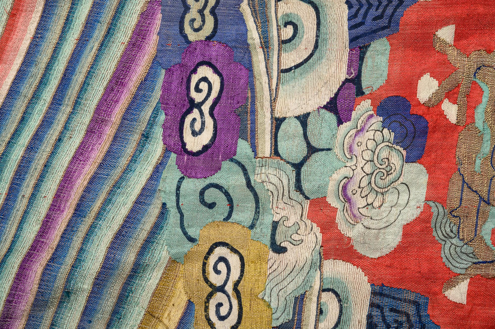 A Red Ground Kesi Woven Silk Theatrcial 'Dragon' Robe