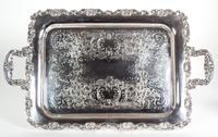 Eight Miscellaneous Silverplate Serving Trays Largest, length over handles 26 1/2 inches.