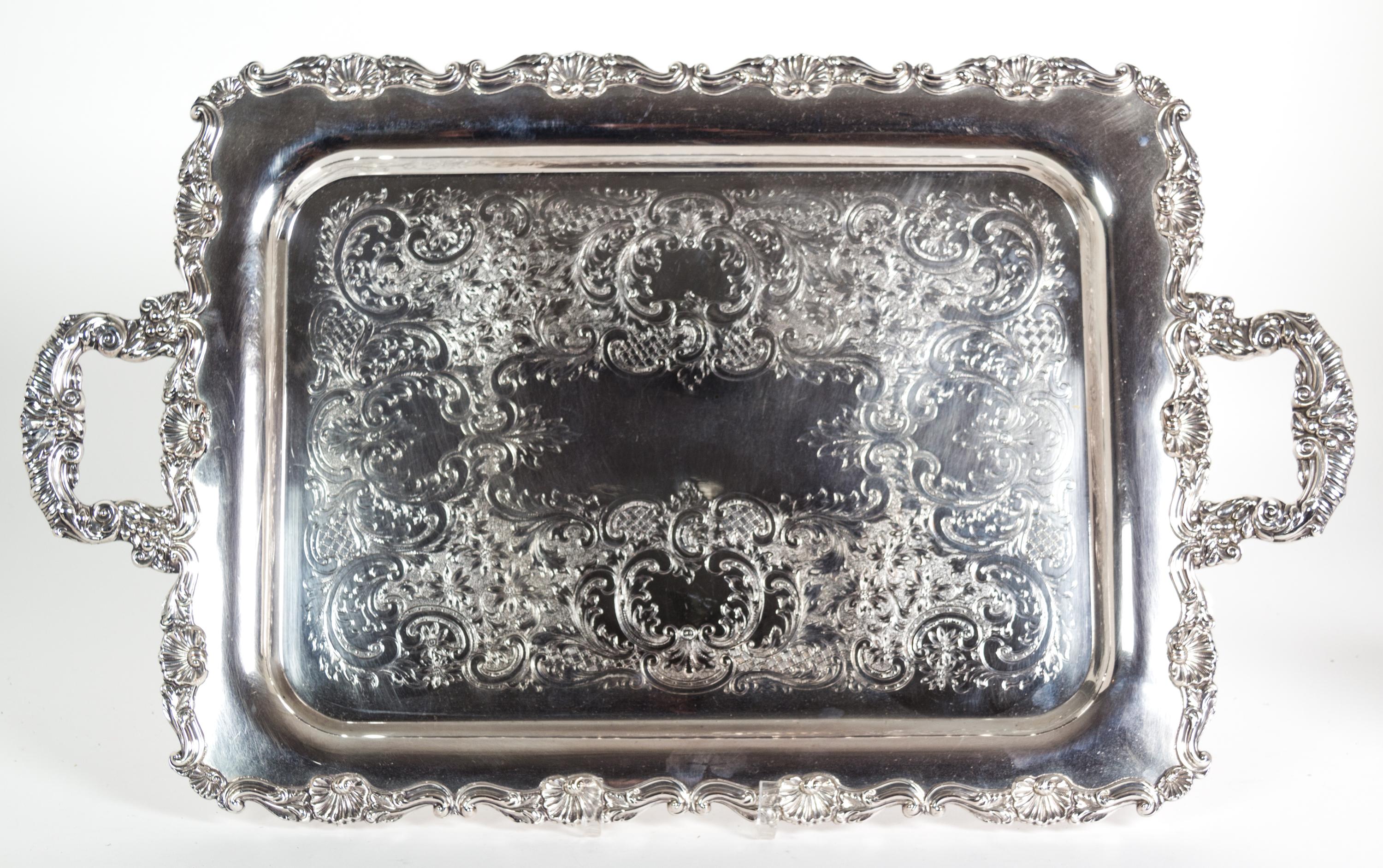 Eight Miscellaneous Silverplate Serving Trays Largest, length over handles 26 1/2 inches.