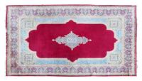 A Kerman Wool Rug Length 16 feet 6 inches x width 10 feet 2 inches. — 20TH CENTURY