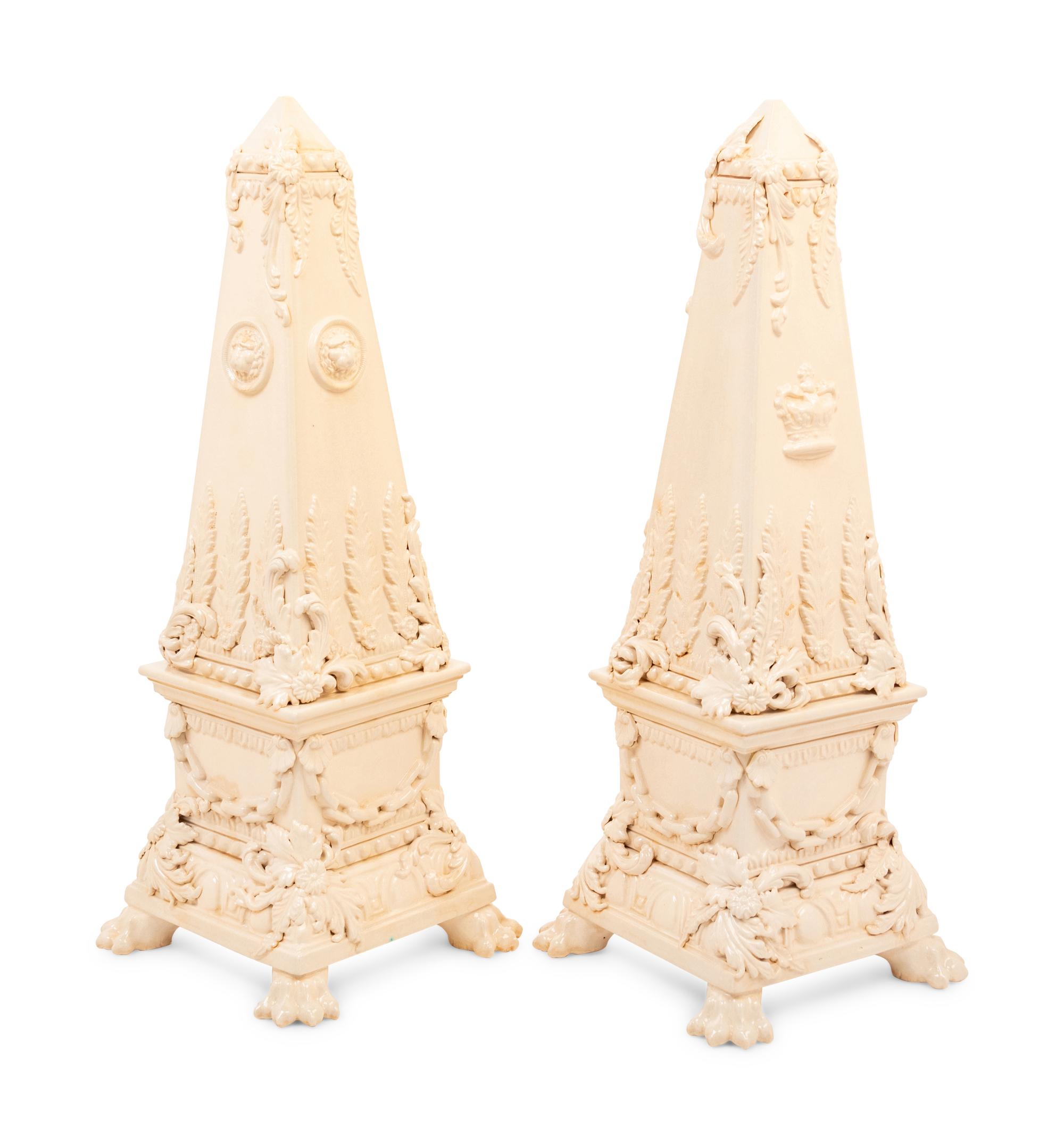 A Near Pair of Peter Weldon Creamware Obelisks