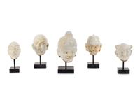 Five Glazed Earthenware Deity Heads