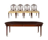 A Mahogany Dining Table and An Associated Set of Eight Mahogany Chairs