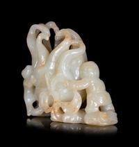 A Celadon Jade Figural Group