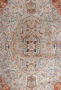 An Indo-Tabriz Wool Rug