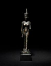 An Egyptian Bronze Striding Neith