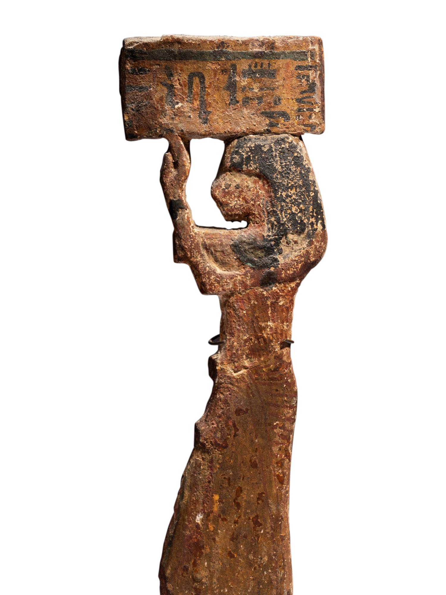 An Egyptian Wood Offering Bearer