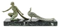 Art Deco, USA, c.1930, a sculpture, depicting a woman with a peacock