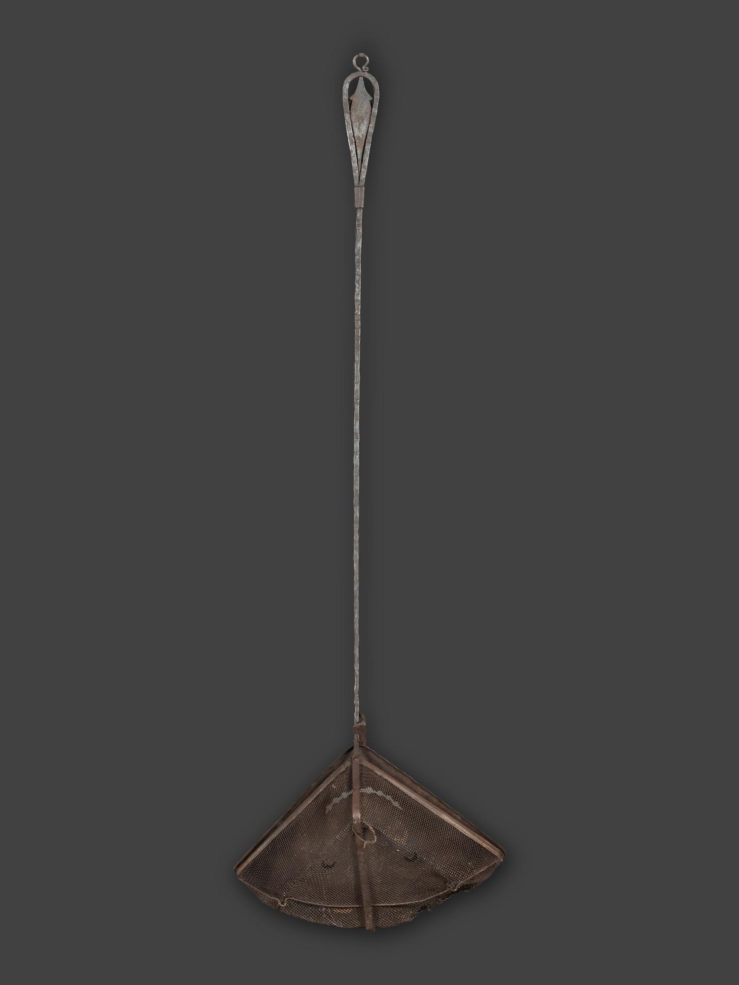 A Forged and Hammered Iron Figural Chestnut Roaster