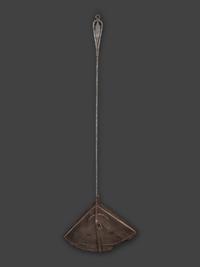 A Forged and Hammered Iron Figural Chestnut Roaster