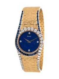 PIAGET, 18K YELLOW GOLD, LAPIS LAZULI, DIAMOND AND SAPPHIRE WRISTWATCH