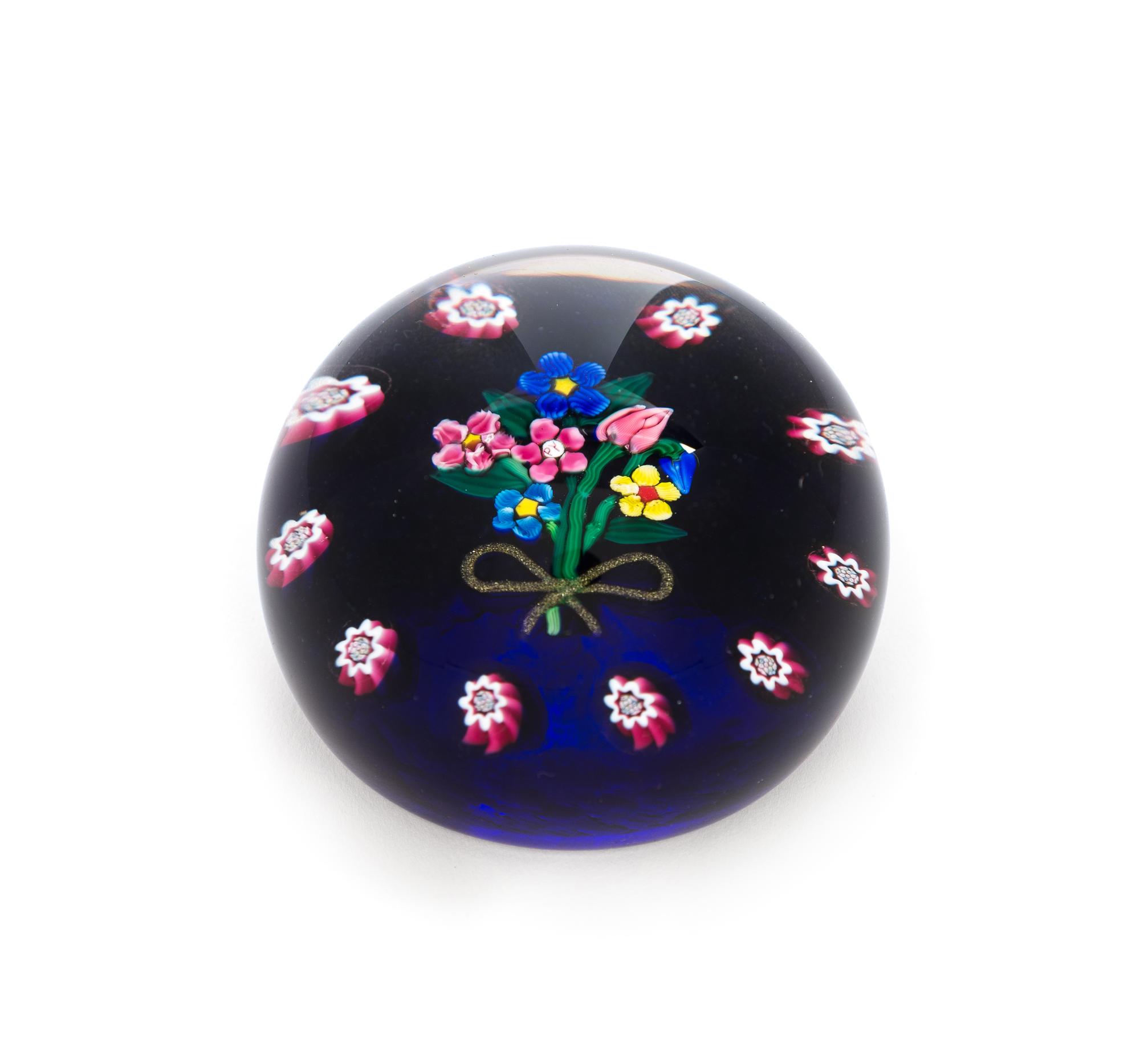 Paul Ysart, (Spanish, 1904-1991), a Seven-Flower Bouquet on Blue Ground paperweight
