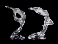 A Pair of Lalique Molded and Frosted Glass Figures, Height 10 inches.