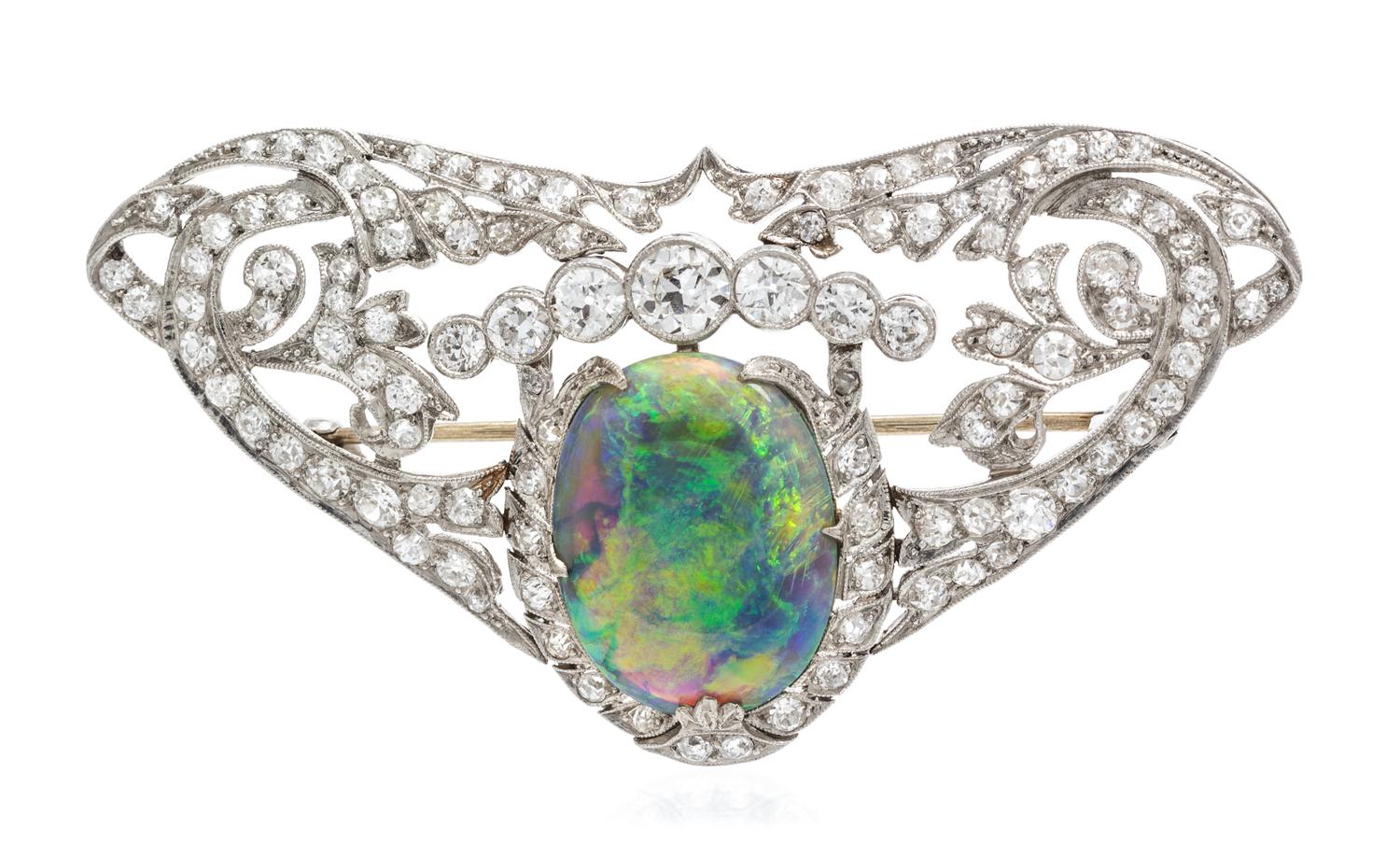 An Edwardian Platinum, Black Opal and Diamond Brooch, 9.50 dwts.