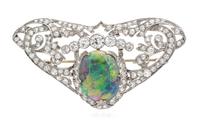 An Edwardian Platinum, Black Opal and Diamond Brooch, 9.50 dwts.