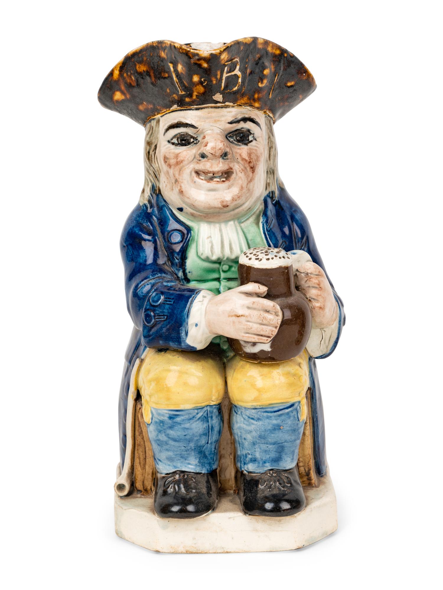 A Dr. Johnson Toby Jug and Two Other Toby Jugs