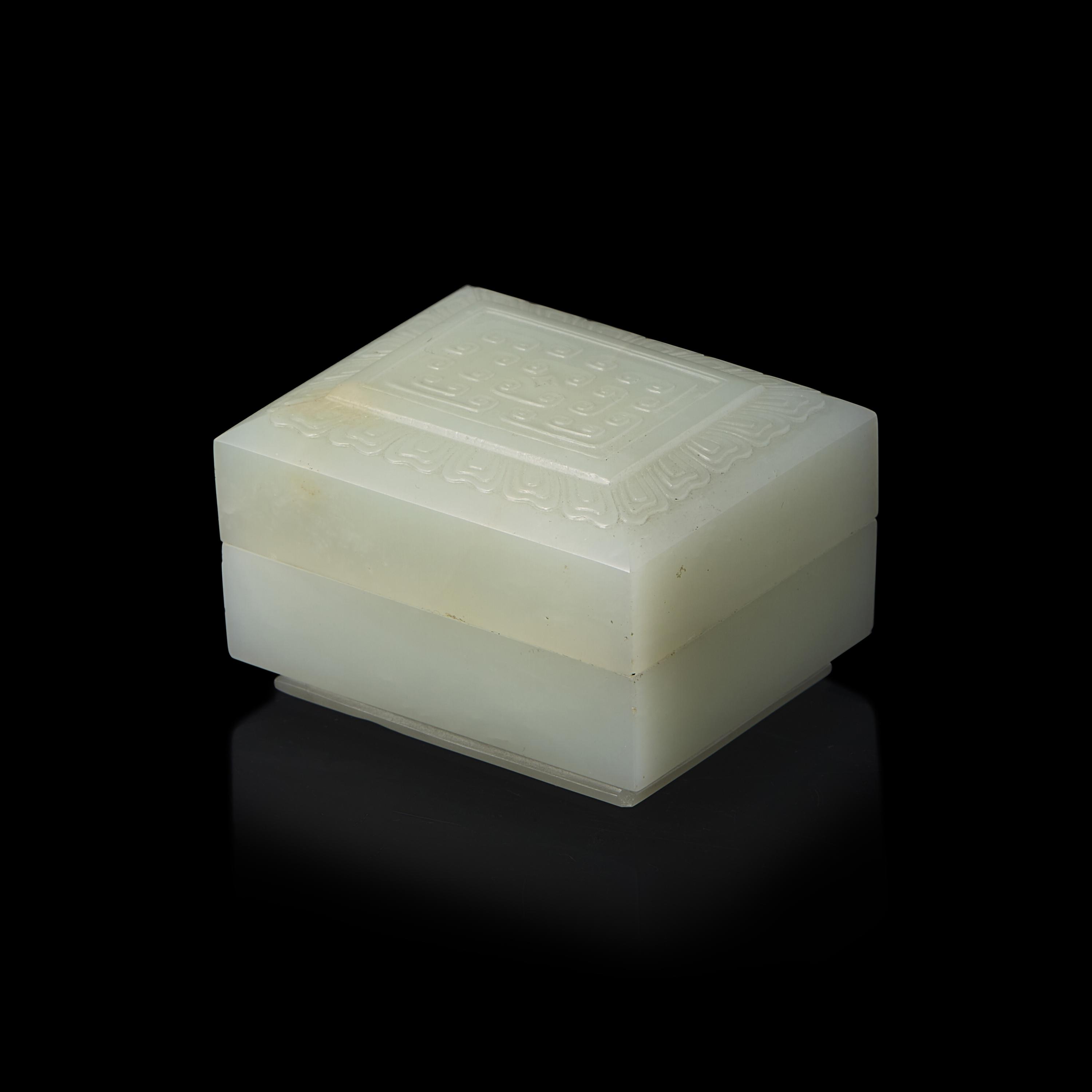 A Chinese Carved White Jade Box and Cover 白玉仿古紋方形蓋盒
