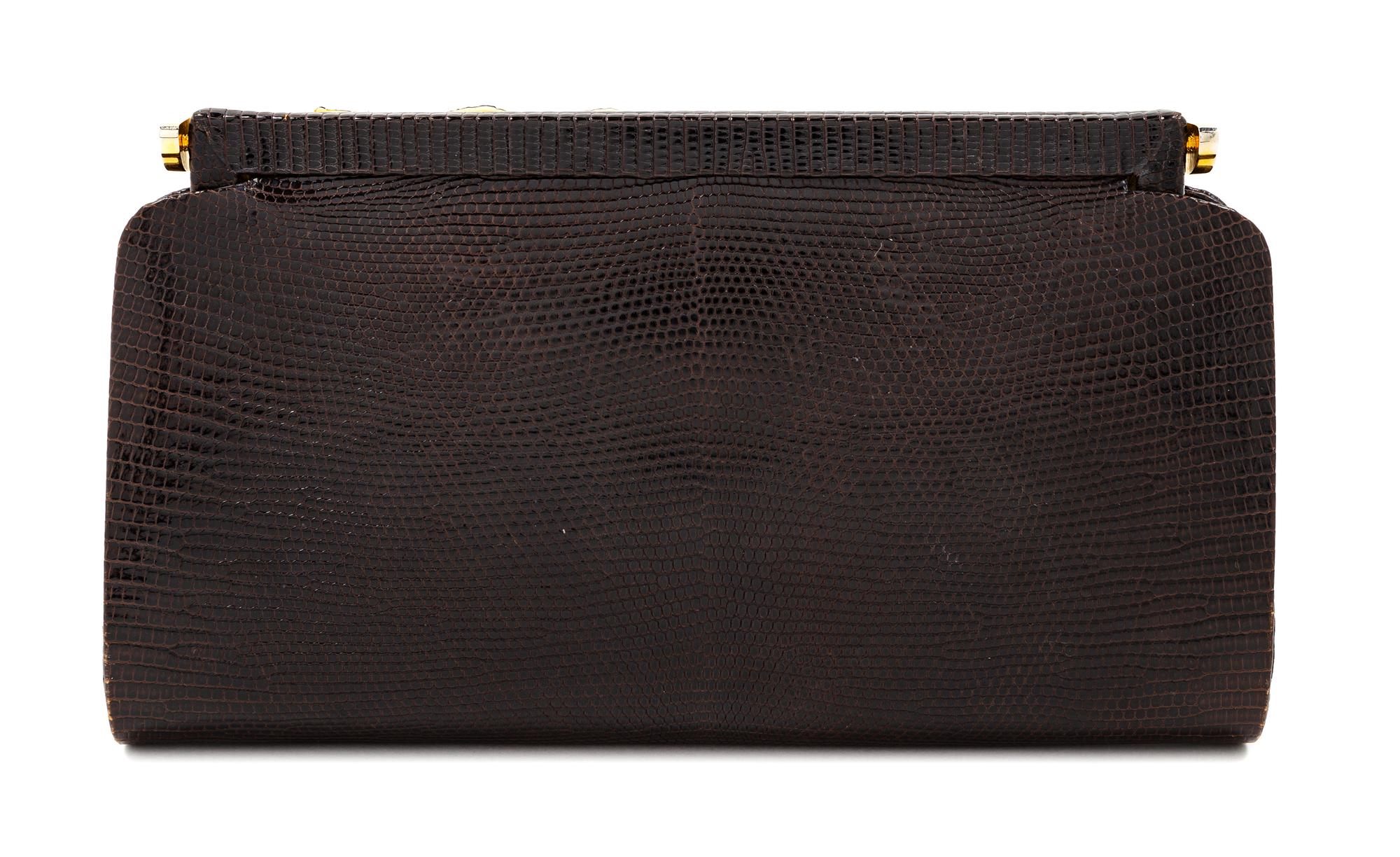 A Gucci Brown Snakeskin Clutch, 4.75" H x 8.25" W x 1.25" D.