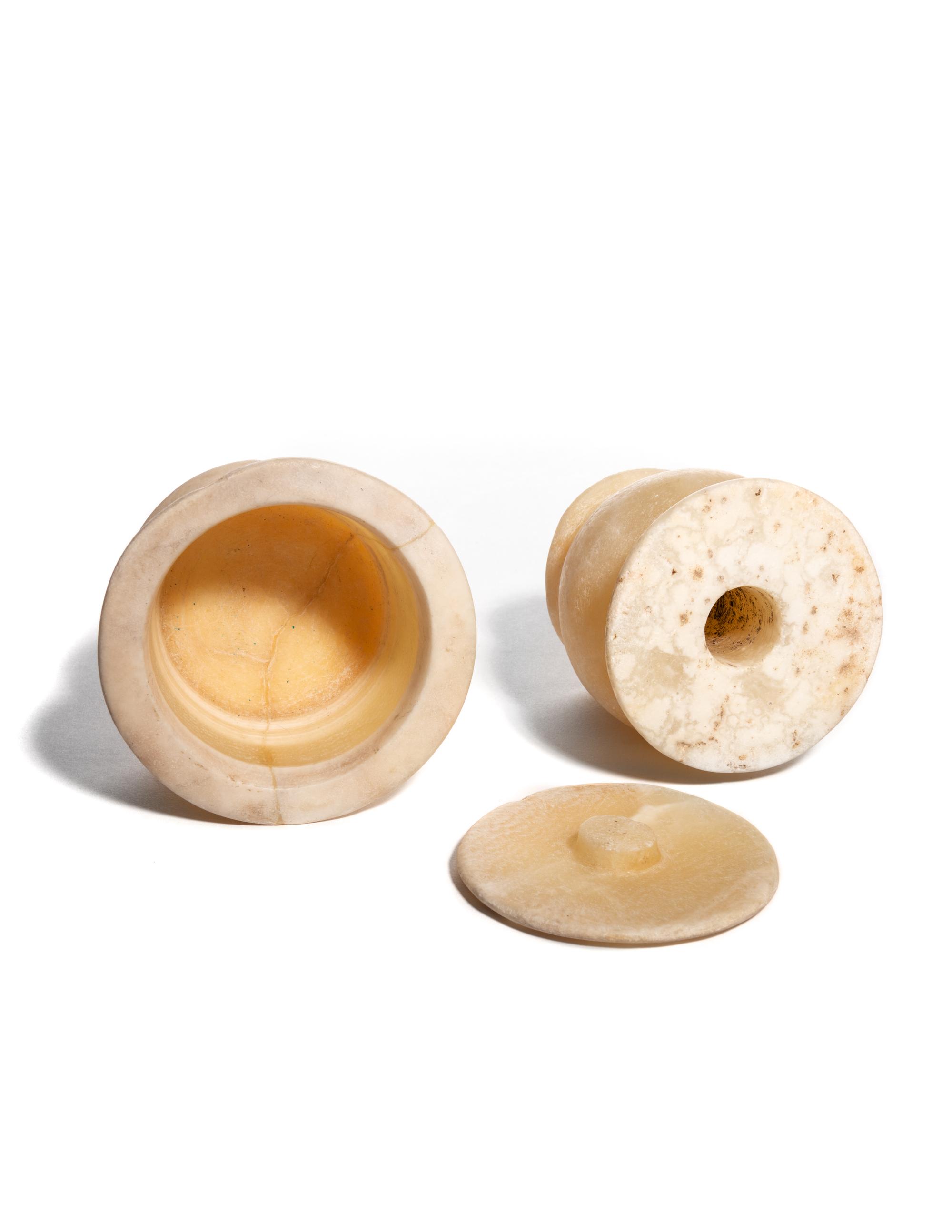 An Egyptian Alabaster Jar and a Lidded Kohl Pot