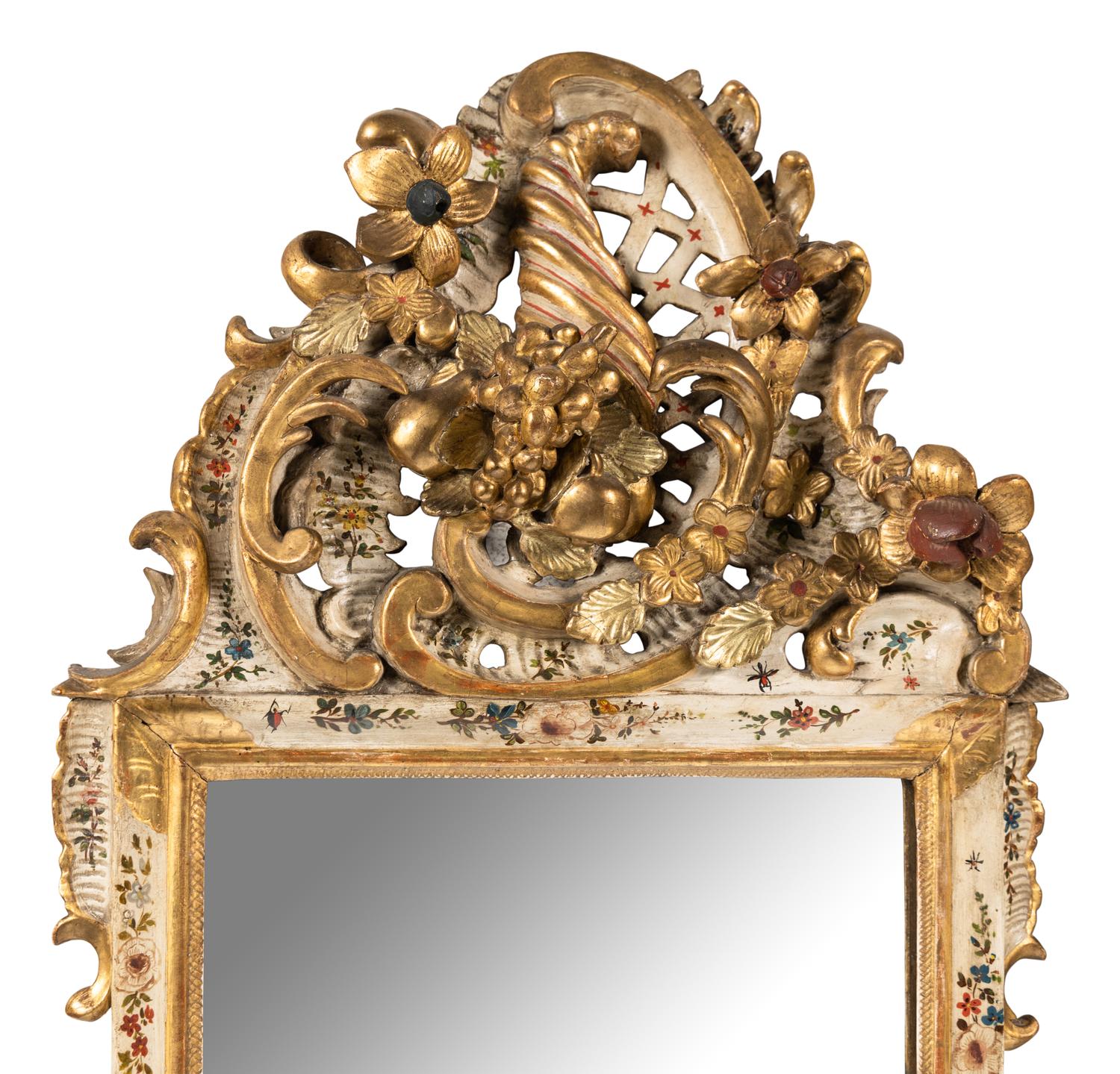 A Pair of South German Painted and Parcel Gilt Mirrors