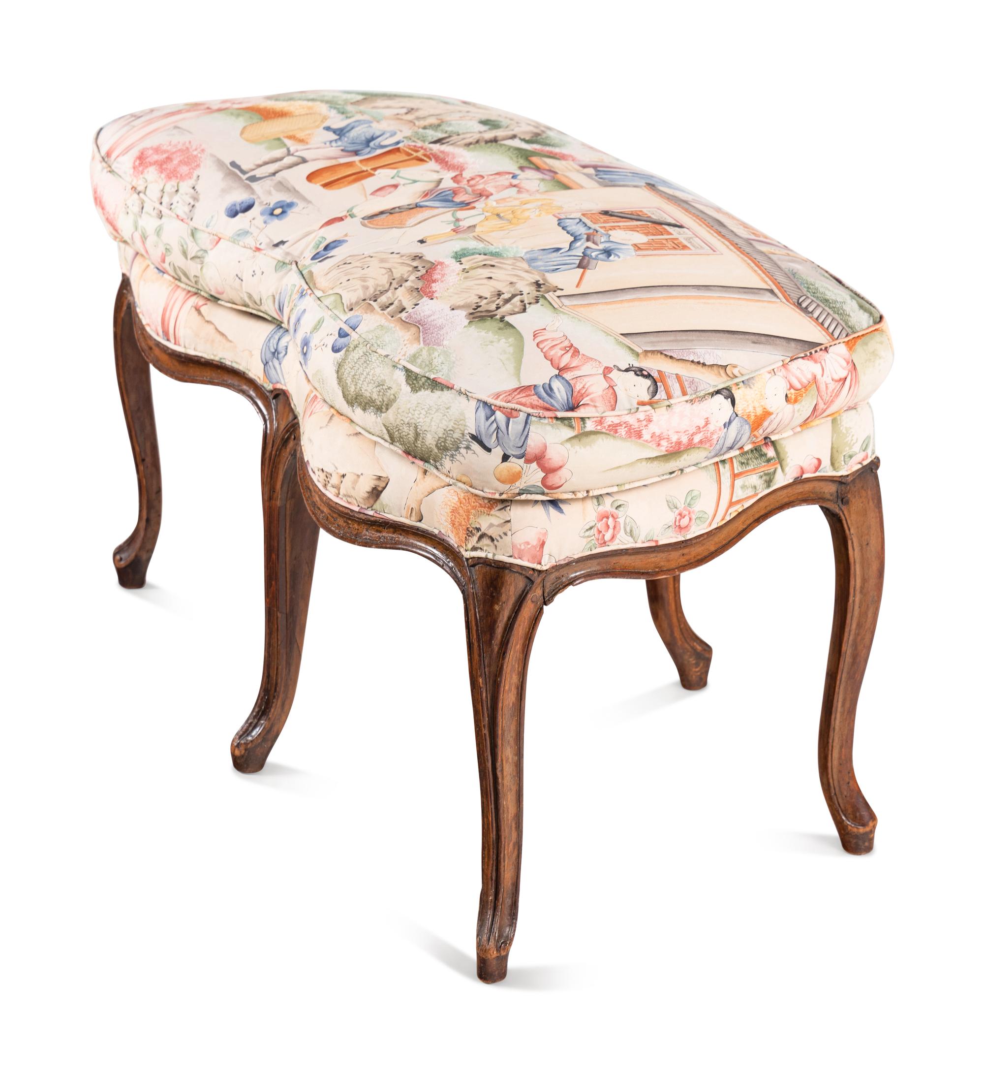 A Louis XV Carved Walnut Bench