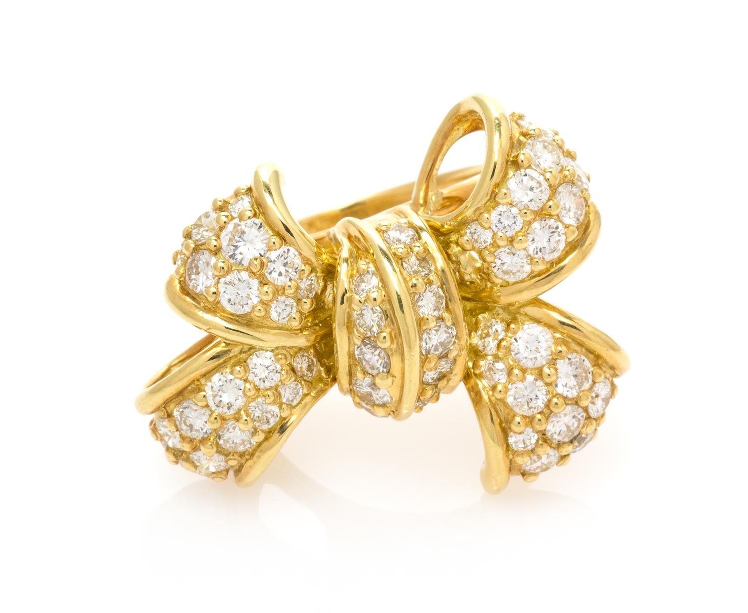 An 18 Karat Yellow Gold and Diamond Bow Motif Ring, Jose Hess, 9.15 dwts.