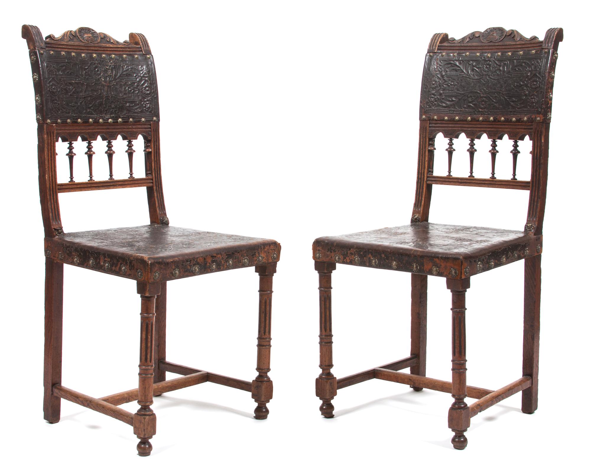 A Pair of Renaissance Revival Hall Chairs Height 37 1/2 inches. — 19TH CENTURY