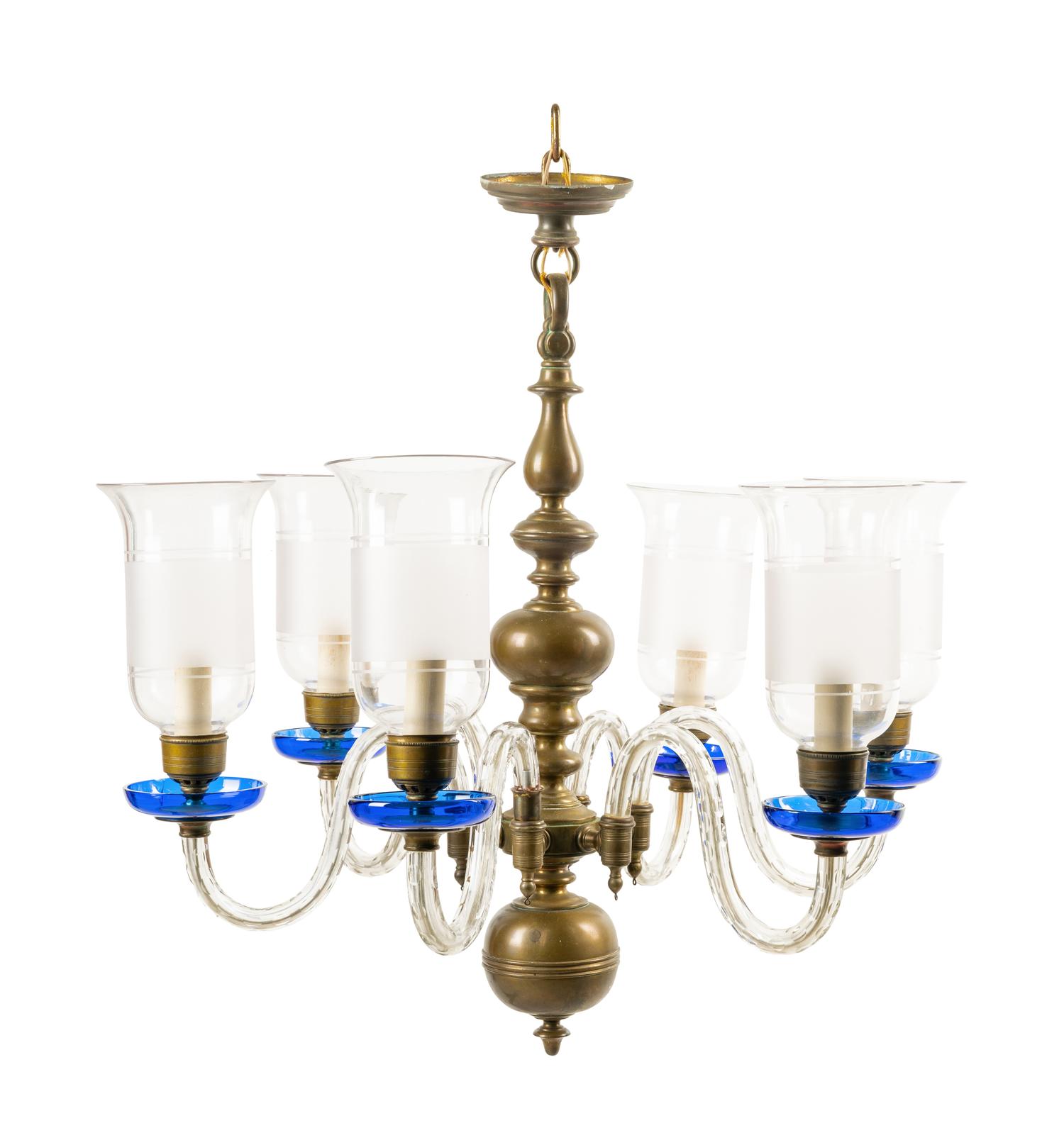 A Baroque Style Brass and Glass Six-Light Chandelier