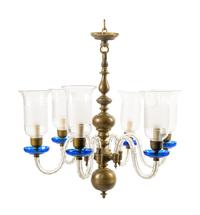 A Baroque Style Brass and Glass Six-Light Chandelier