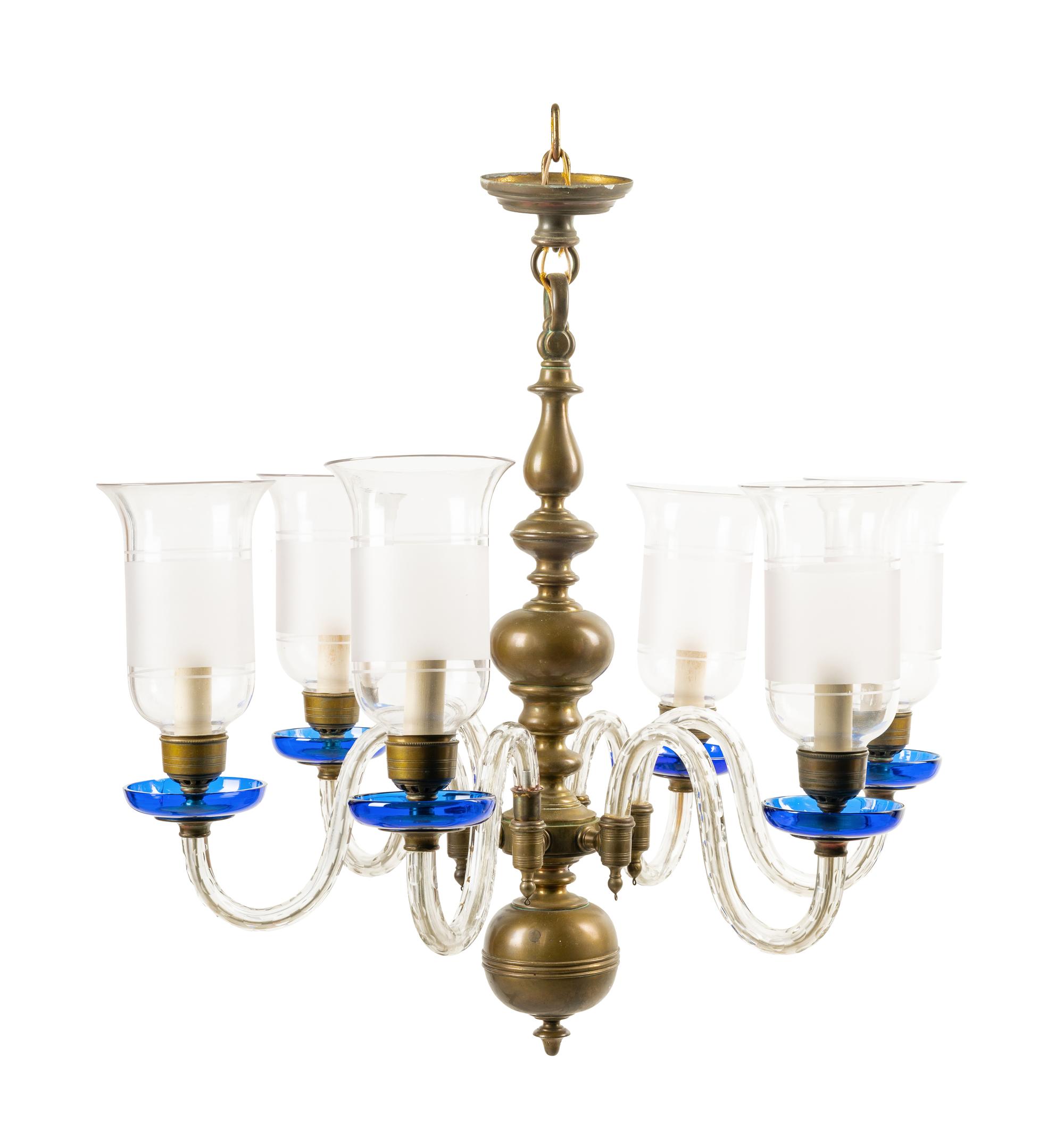A Baroque Style Brass and Glass Six-Light Chandelier