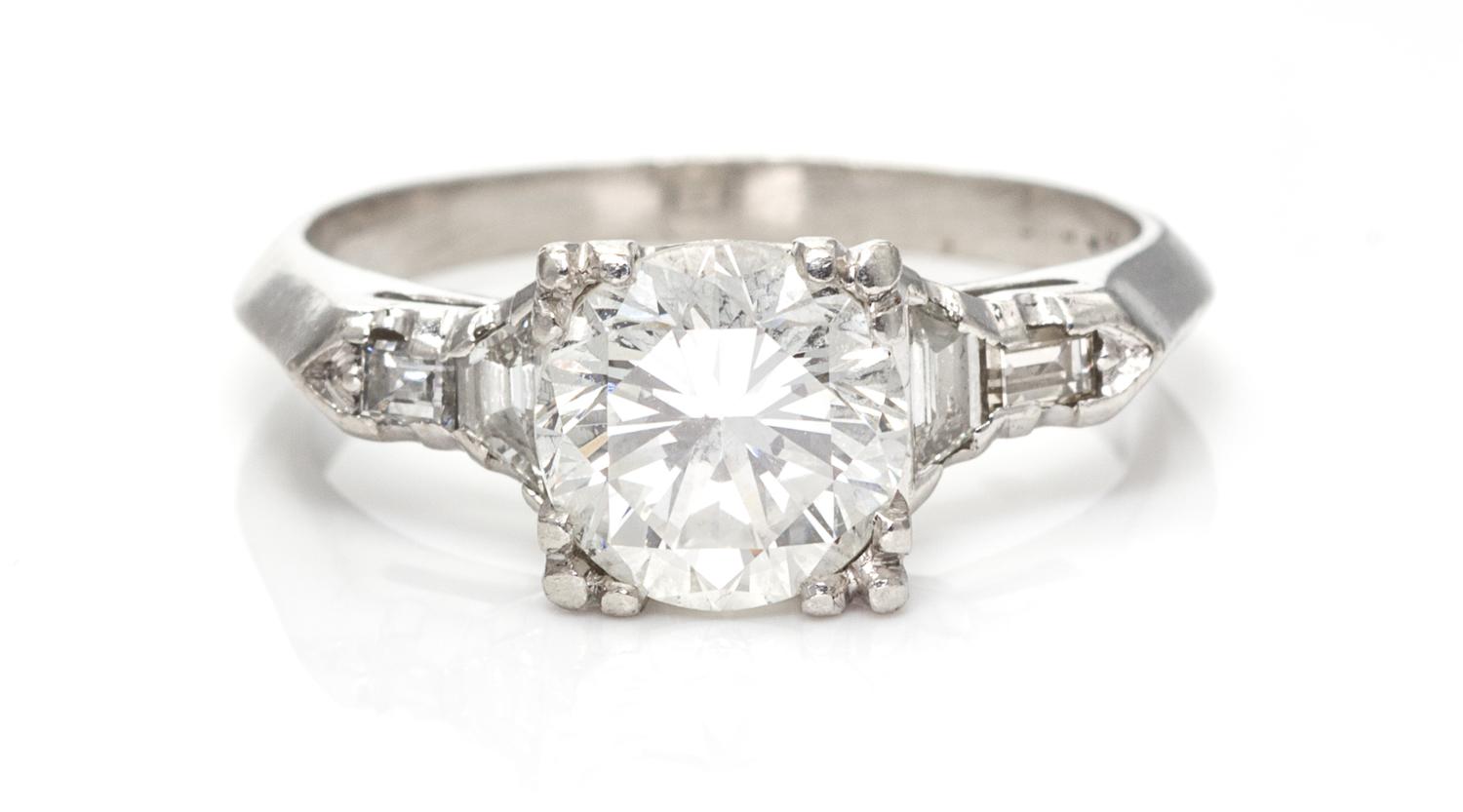 A Platinum and Diamond Ring, 8.20 dwts.