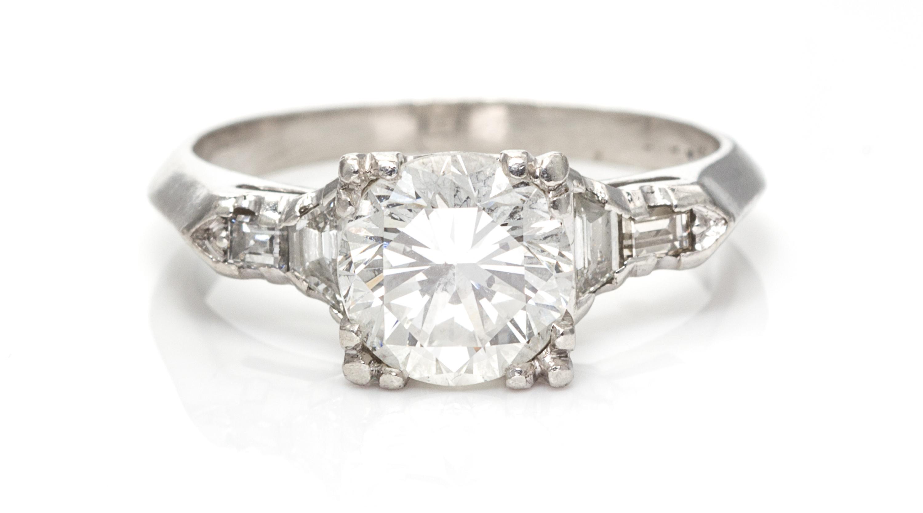 A Platinum and Diamond Ring, 8.20 dwts.