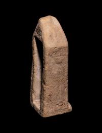 An Egyptian Limestone Case in the Form of an Obelisk with Osiris and Isis