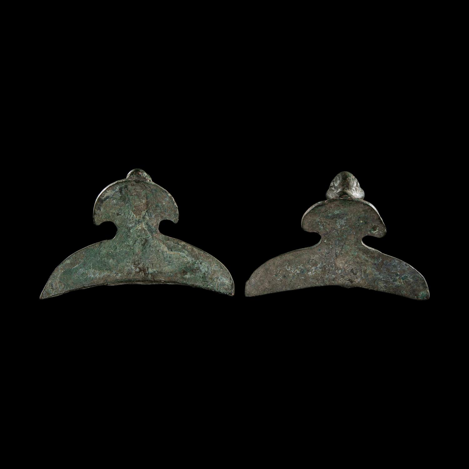 A Pair of Etruscan Bronze Vessel Handles
