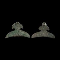 A Pair of Etruscan Bronze Vessel Handles