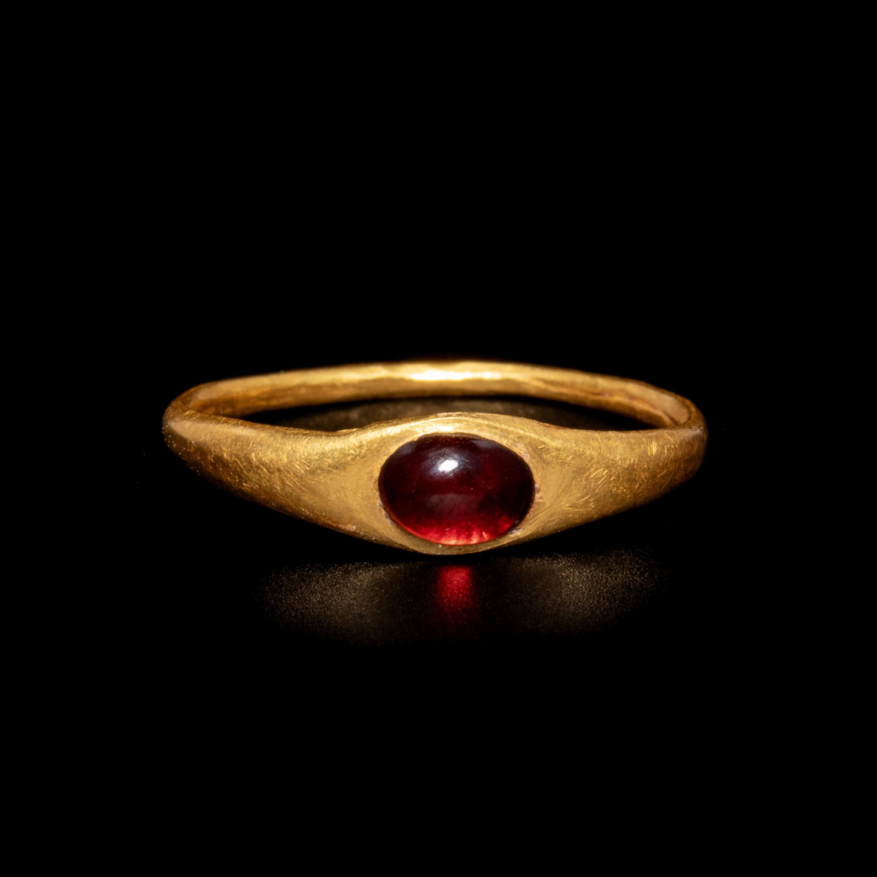 A Roman Gold and Garnet Finger Ring