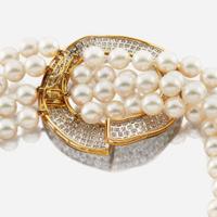 A cultured pearl, diamond, gold, and platinum necklace
