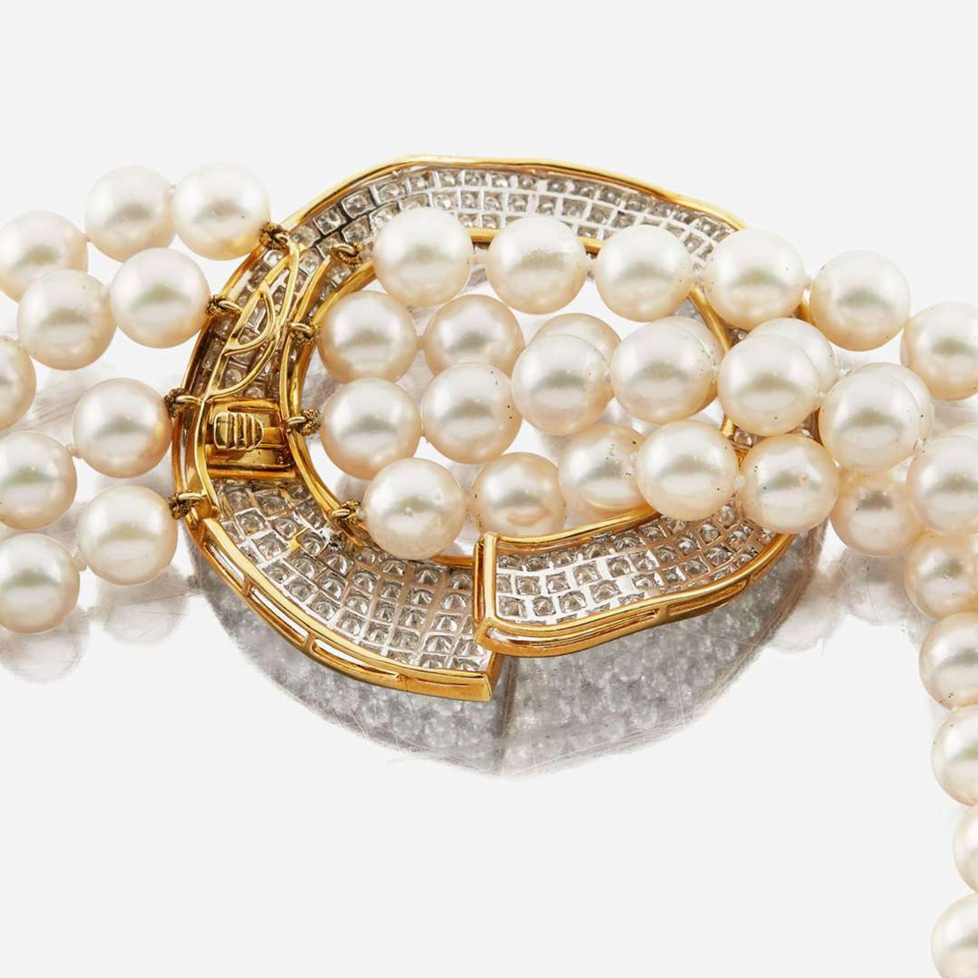 A cultured pearl, diamond, gold, and platinum necklace