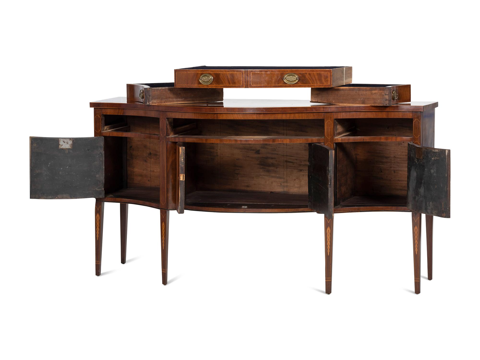 A Federal Inlaid and Figured Mahogany Serpentine Sideboard